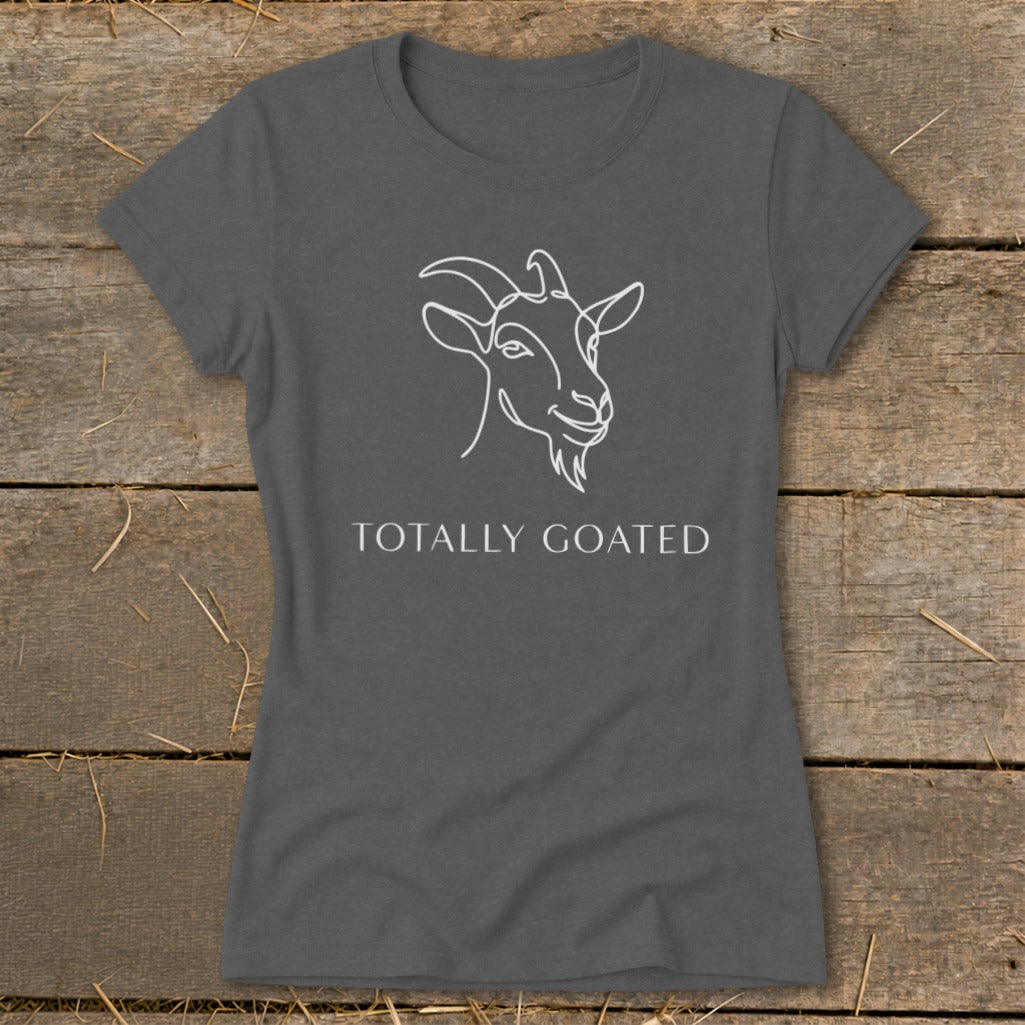 Gray t-shirt with white line drawing of a goat and text "TOTALLY GOATED".