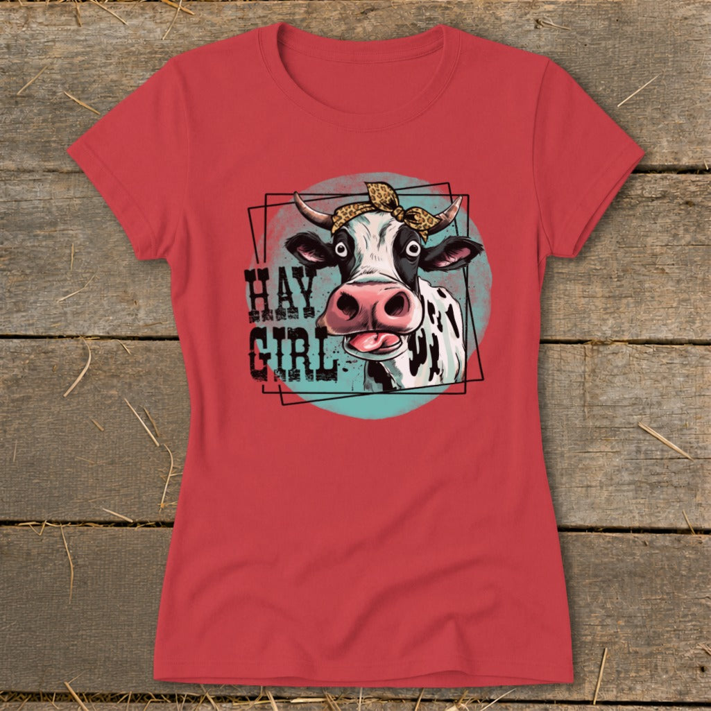 Red t-shirt with a cow wearing a bandana, saying "Hay Girl".