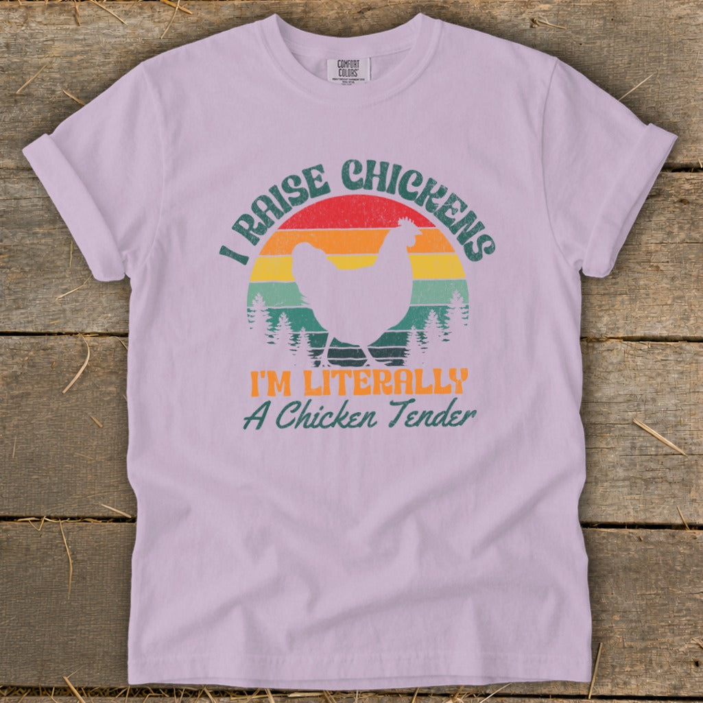 T-shirt with "I raise chickens, I'm literally a chicken tender" text and chicken graphic.