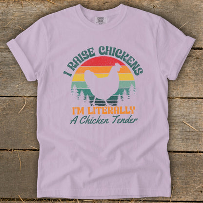 T-shirt with "I raise chickens, I'm literally a chicken tender" text and chicken graphic.