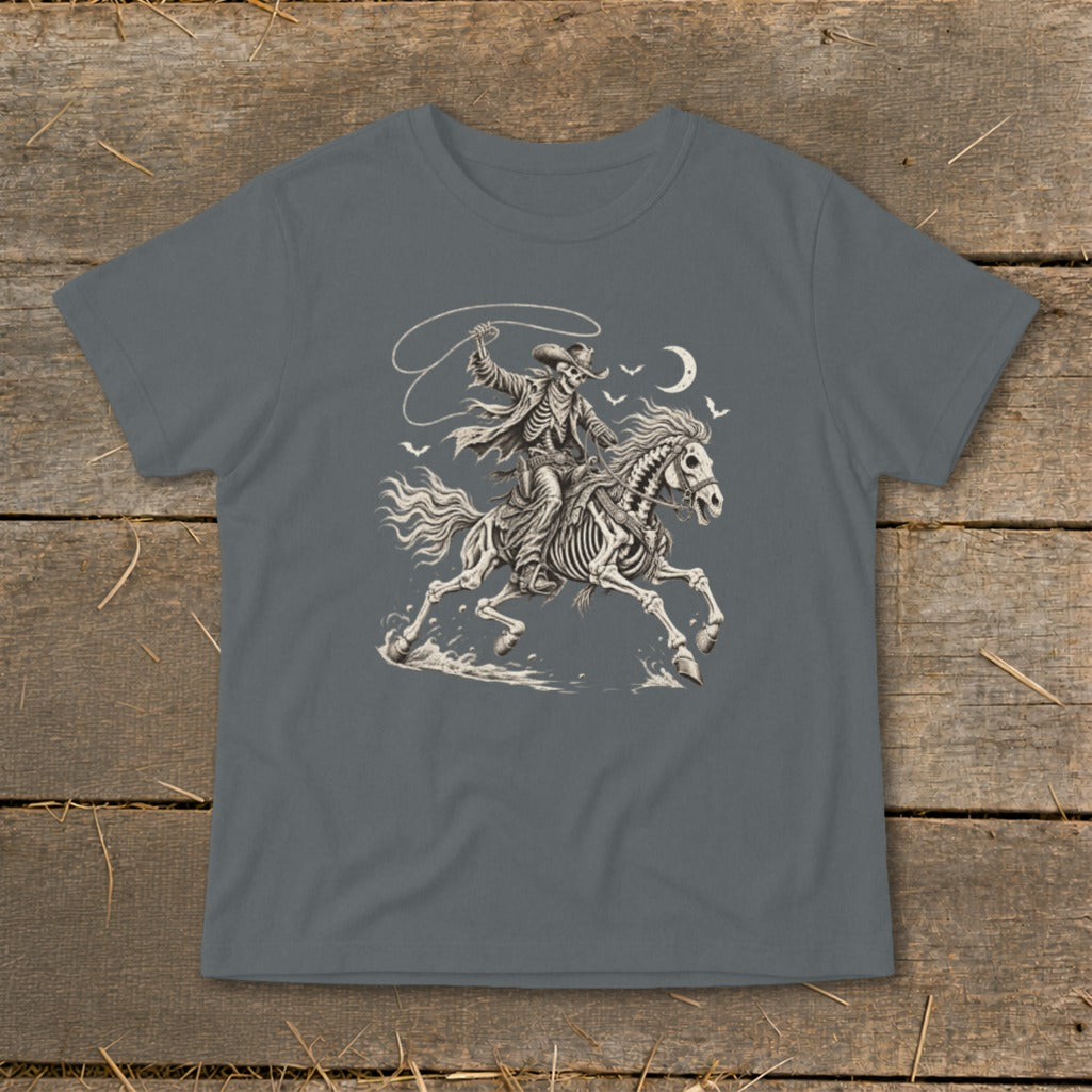 Skeleton cowboy on horseback with lasso under a crescent moon and bats.