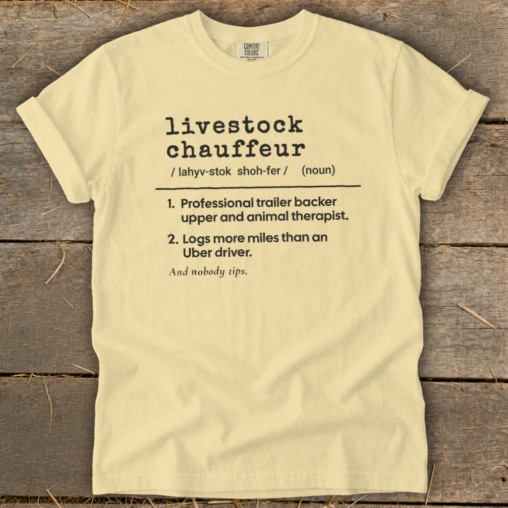Yellow t-shirt with black text defining "livestock chauffeur".