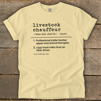 Yellow t-shirt with black text defining "livestock chauffeur".