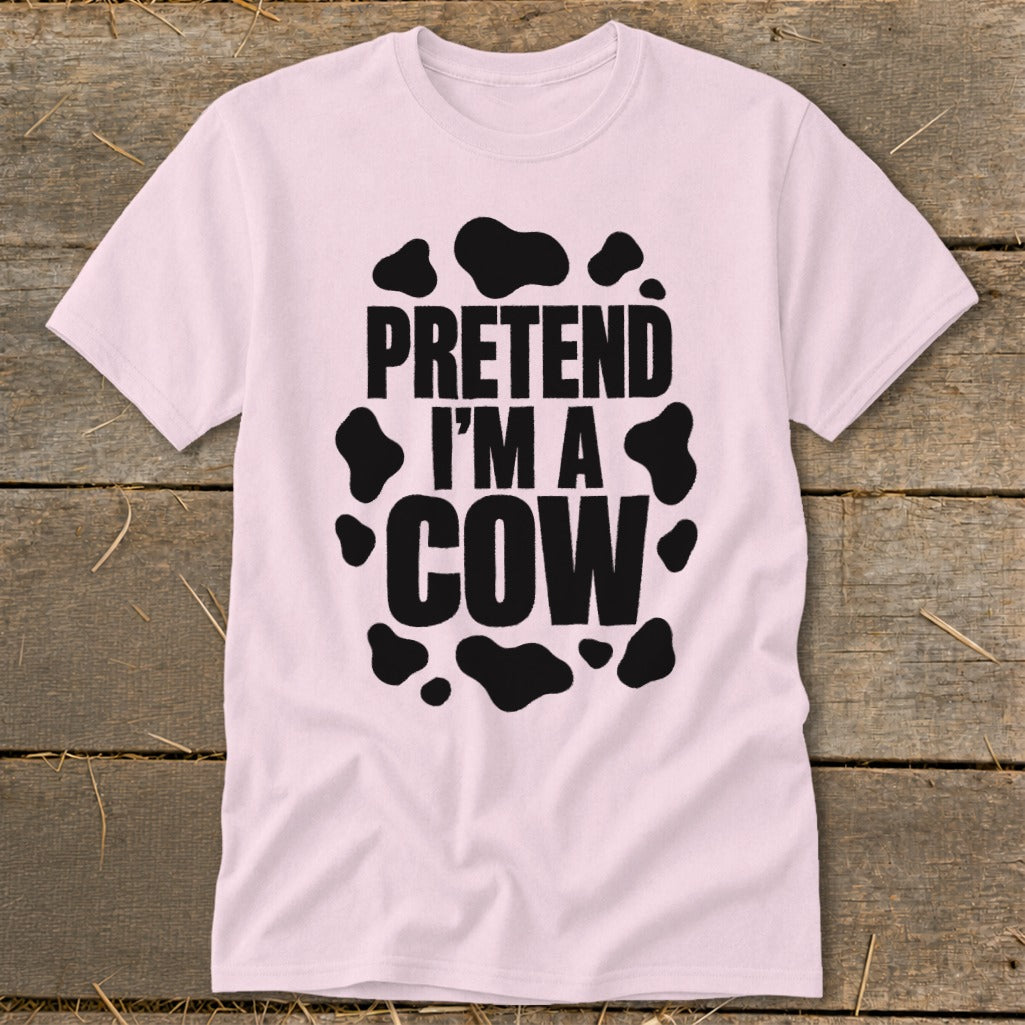 Light pink t-shirt with black text "PRETEND I'M A COW" and cow spots.