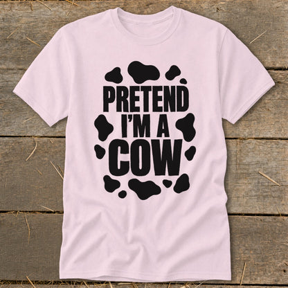 Light pink t-shirt with black text "PRETEND I'M A COW" and cow spots.