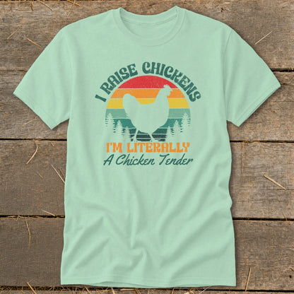 Light mint t-shirt with "I raise chickens I'm literally a chicken tender" text and chicken graphic.