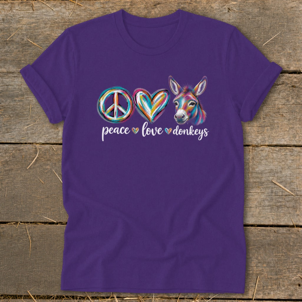 Purple t-shirt with peace, love, and donkey graphic and text.