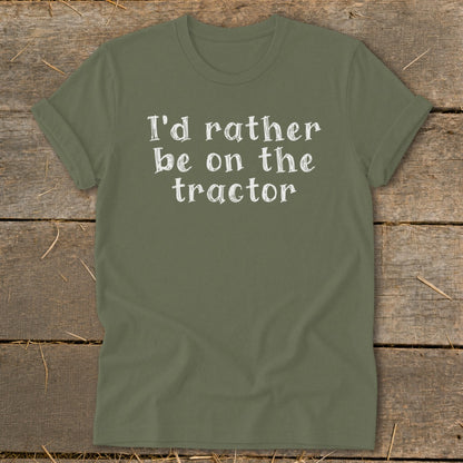 Olive green t-shirt with white text reading "I'd rather be on the tractor".