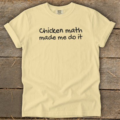 Pale yellow t-shirt with black text that reads "Chicken math made me do it".
