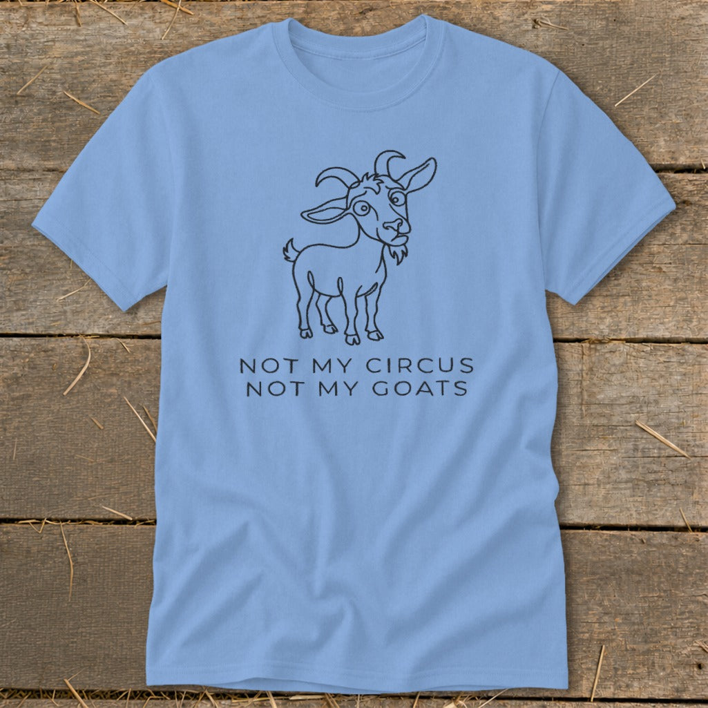 Light blue t-shirt with a line drawing of a goat and text "NOT MY CIRCUS NOT MY GOATS".