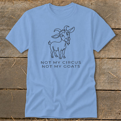 Light blue t-shirt with a line drawing of a goat and text "NOT MY CIRCUS NOT MY GOATS".