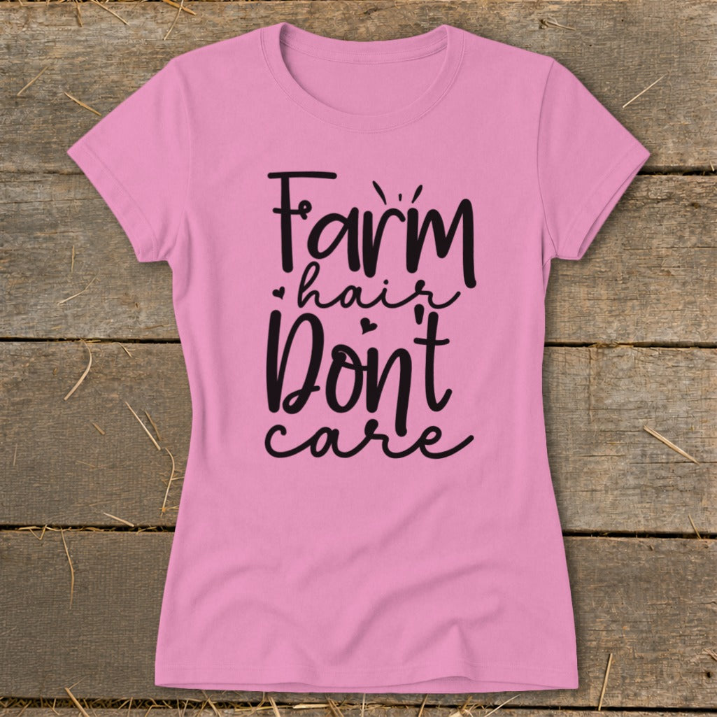 Pink t-shirt with black text "Farm hair Don't care".