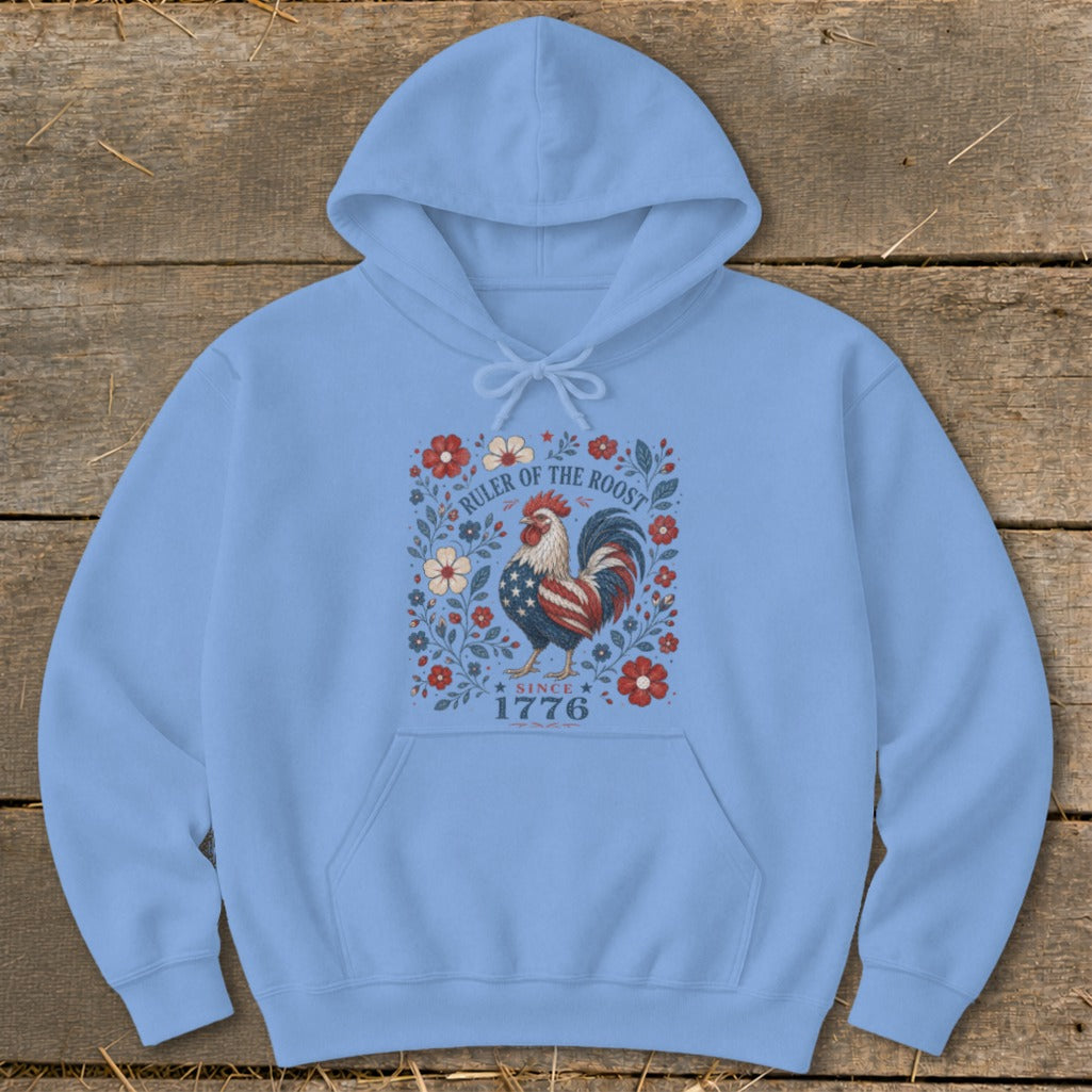 Light blue hoodie with patriotic rooster design and text "RULER OF THE ROOST SINCE 1776".