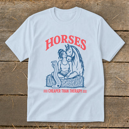 Light blue t-shirt with "HORSES CHEAPER THAN THERAPY" and graphic of woman with horse.