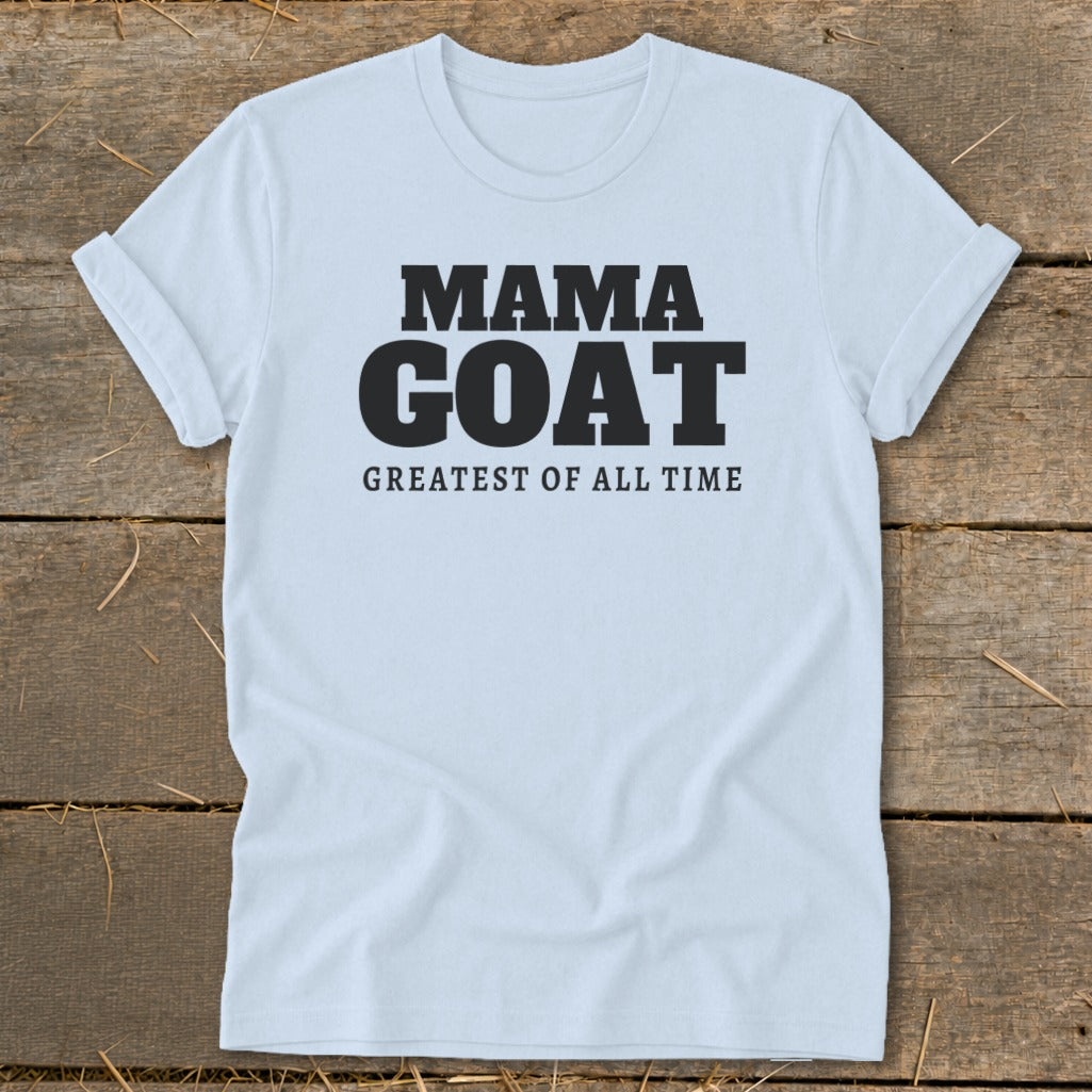 White t-shirt with black text that reads "MAMA GOAT GREATEST OF ALL TIME".