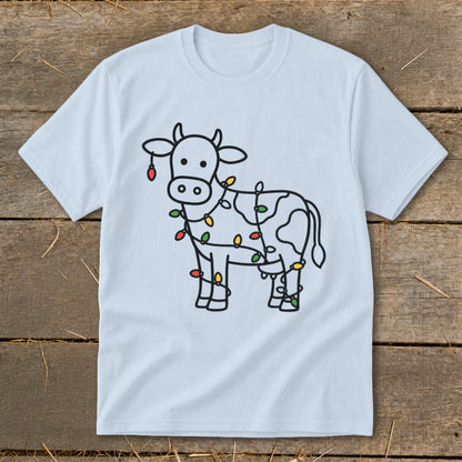 Light blue t-shirt with black line drawing of a cow covered in colorful Christmas lights.