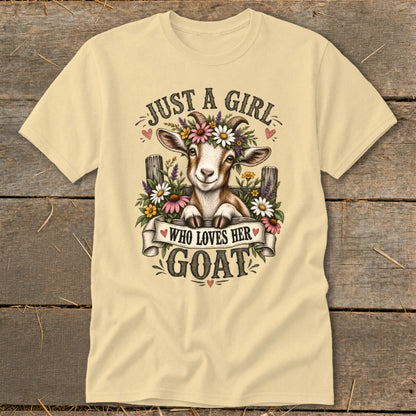 Cream t-shirt with a goat wearing flowers, text reads "Just a girl who loves her goat."