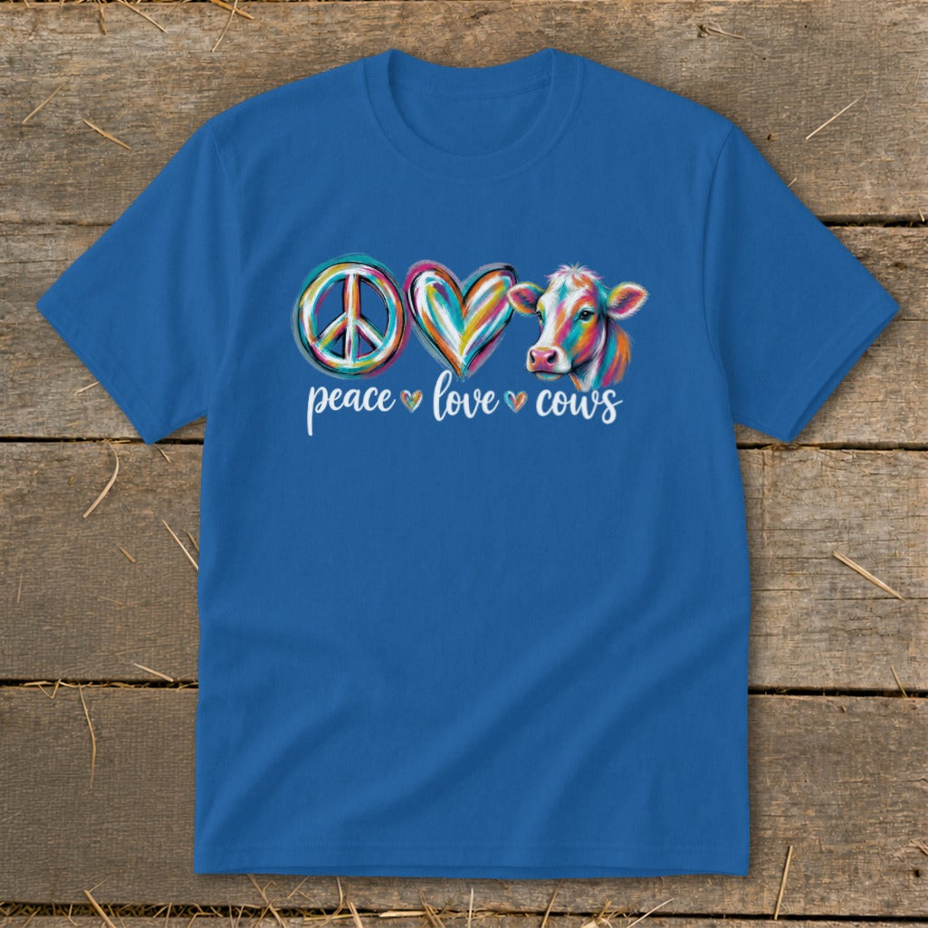 Blue t-shirt with peace, heart, and cow graphic text "peace love cows".