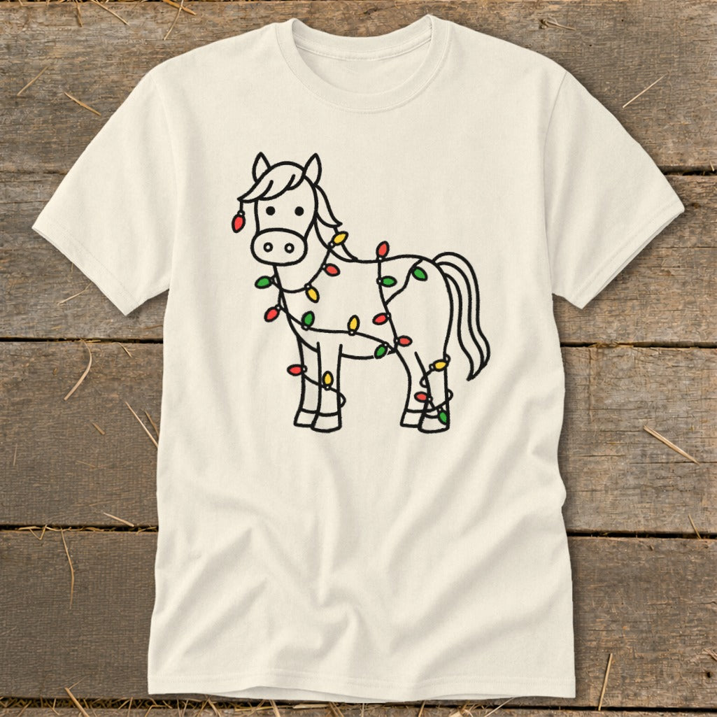 Cream t-shirt with a black outline drawing of a horse decorated with colorful Christmas lights.