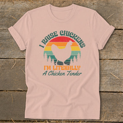 Pink t-shirt with vintage sunset graphic and text "I RAISE CHICKENS I'M LITERALLY A Chicken Tender".