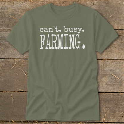 Olive green t-shirt with white text reading "can't. busy. FARMING."