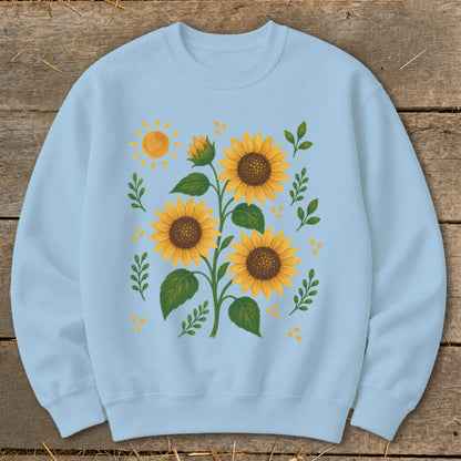 Light blue sweatshirt with a stylized sunflower and sun graphic.
