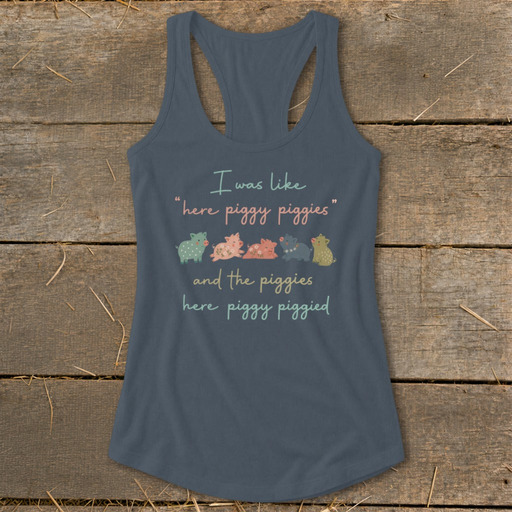 Tank top with text "I was like 'here piggy piggies' and the piggies here piggy piggied" and five cartoon pigs.
