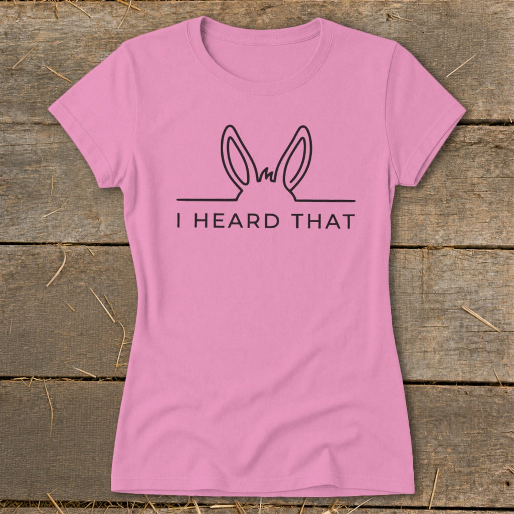 Pink t-shirt with black graphic of donkey ears and the text "I HEARD THAT."