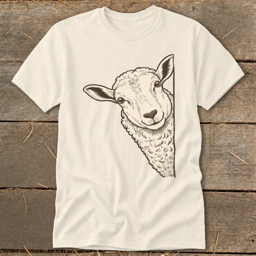 Cream t-shirt with a drawing of a sheep peeking from the side.