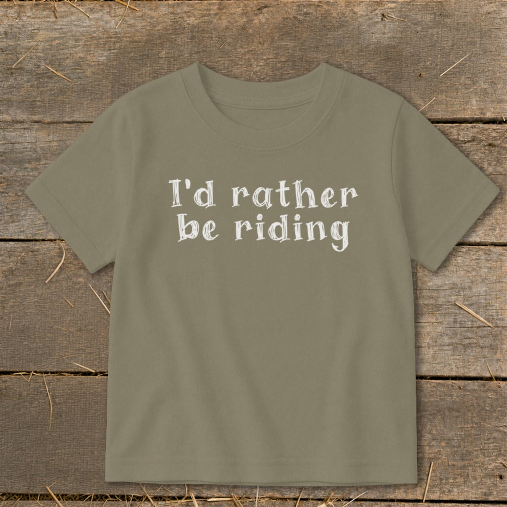 Tan t-shirt with white text that reads "I'd rather be riding."