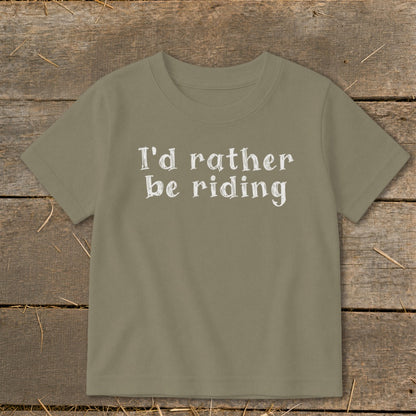 Tan t-shirt with white text that reads "I'd rather be riding."