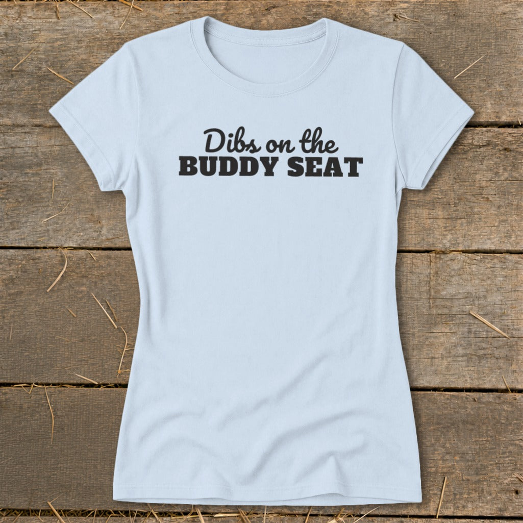 Light blue t-shirt with black text reading "Dibs on the BUDDY SEAT".