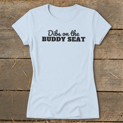Light blue t-shirt with black text reading "Dibs on the BUDDY SEAT".