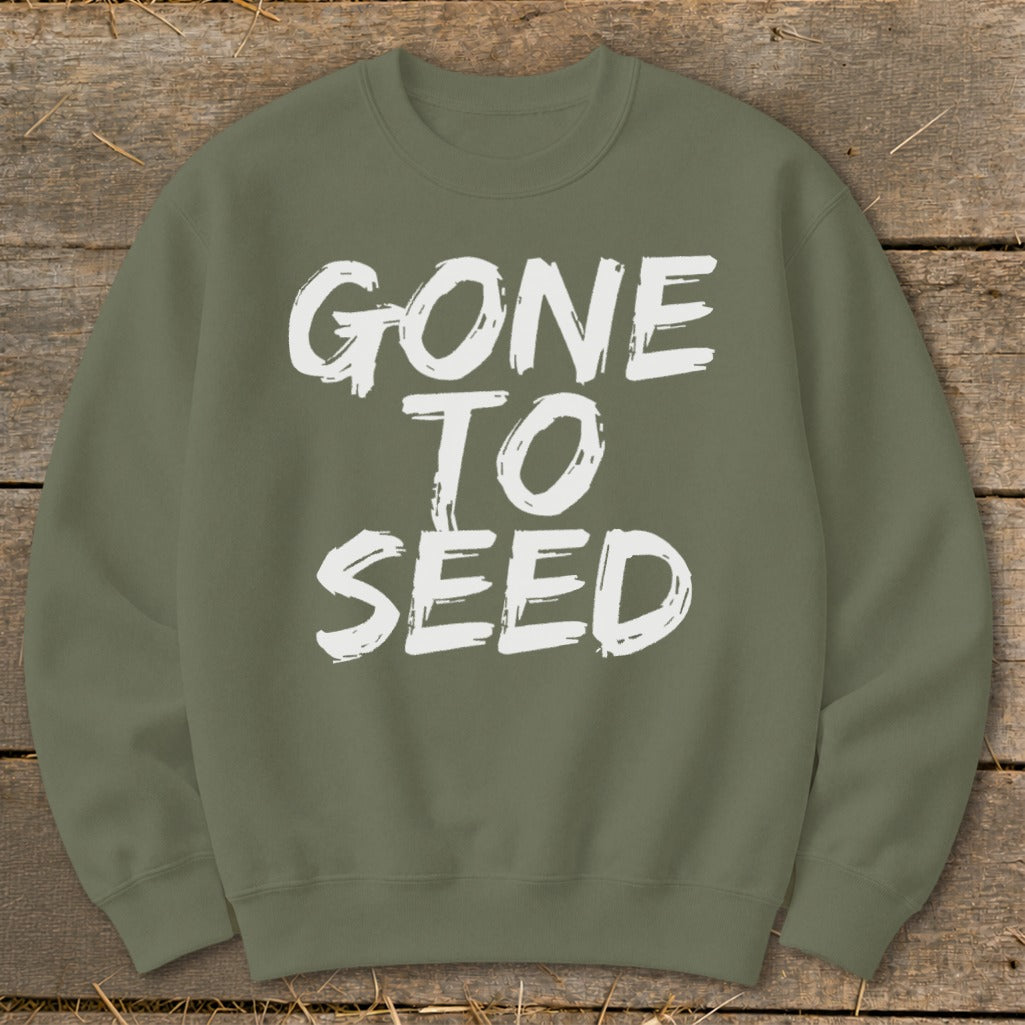 Olive green sweatshirt with white distressed text "GONE TO SEED".