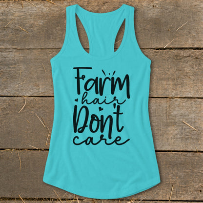 Aqua tank top with black text "Farm hair don't care".