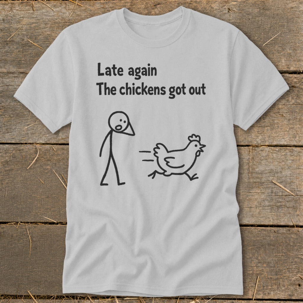 Light grey t-shirt with black text and stick figure drawing of a chicken running away.