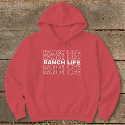 A coral-red hooded sweatshirt with the words RANCH LIFE printed in stacked, outlined white letters across the chest.