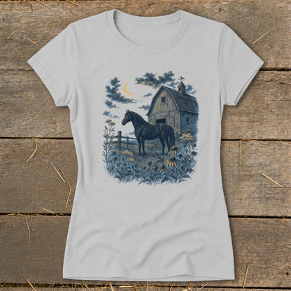 Black horse standing in a field with a barn and crescent moon.