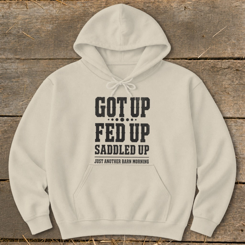 Cream hoodie with black text reading "GOT UP FED UP SADDLED UP JUST ANOTHER BARN MORNING".