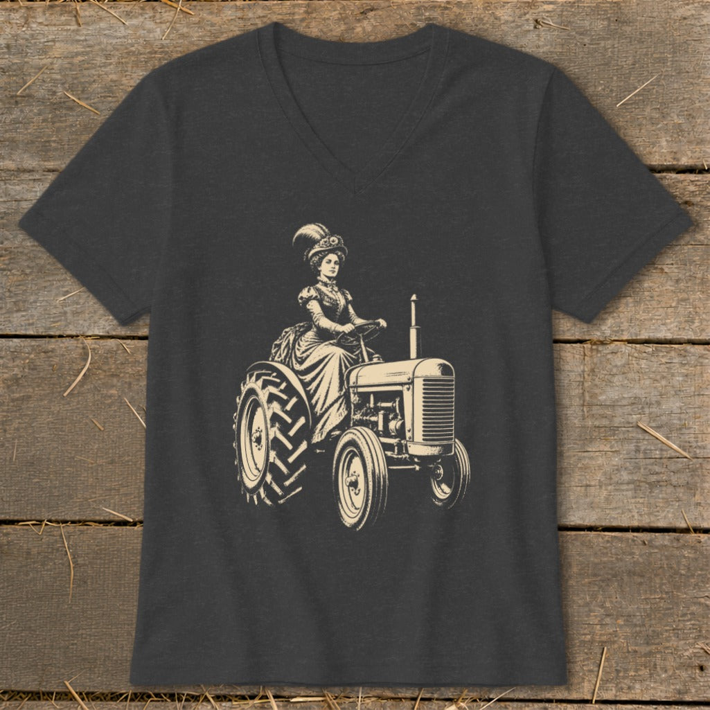 Vintage woman in elegant dress and hat driving a tractor.