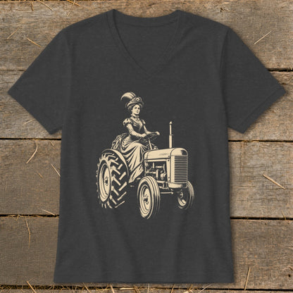 Vintage woman in elegant dress and hat driving a tractor.