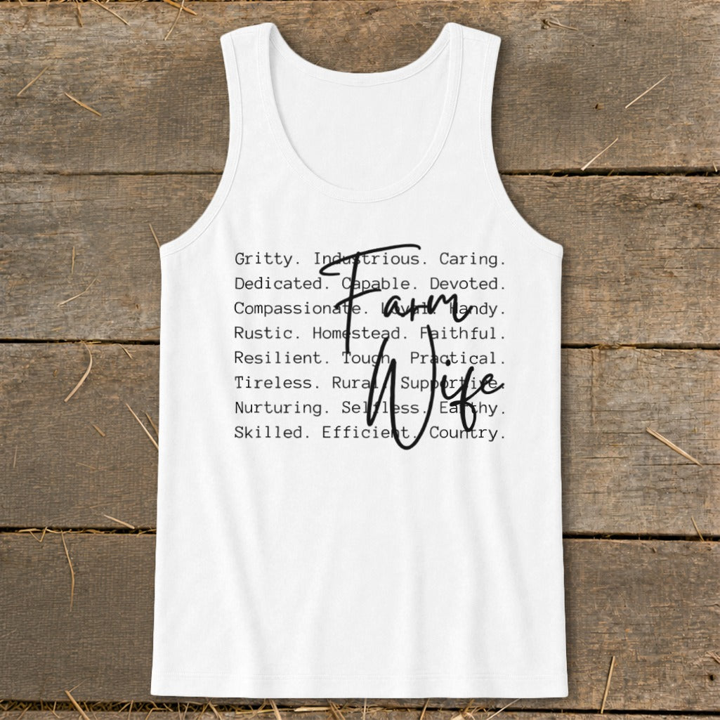 White tank top with "Farm Wife" and descriptive words in black text.