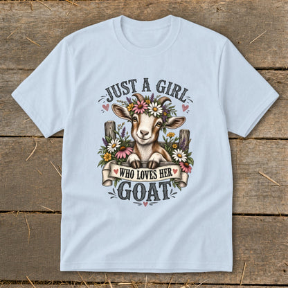 Light blue t-shirt with graphic of a goat wearing flowers and text "Just a girl who loves her goat".