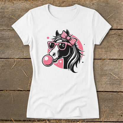 White t-shirt with a black horse head graphic wearing pink sunglasses and a pink bow, blowing a pink bubble.