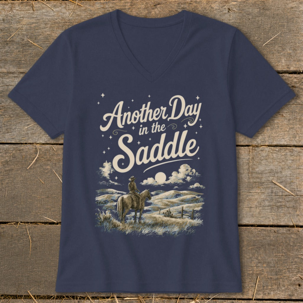 Navy v-neck t-shirt with "Another Day in the Saddle" text and a cowboy on horseback.
