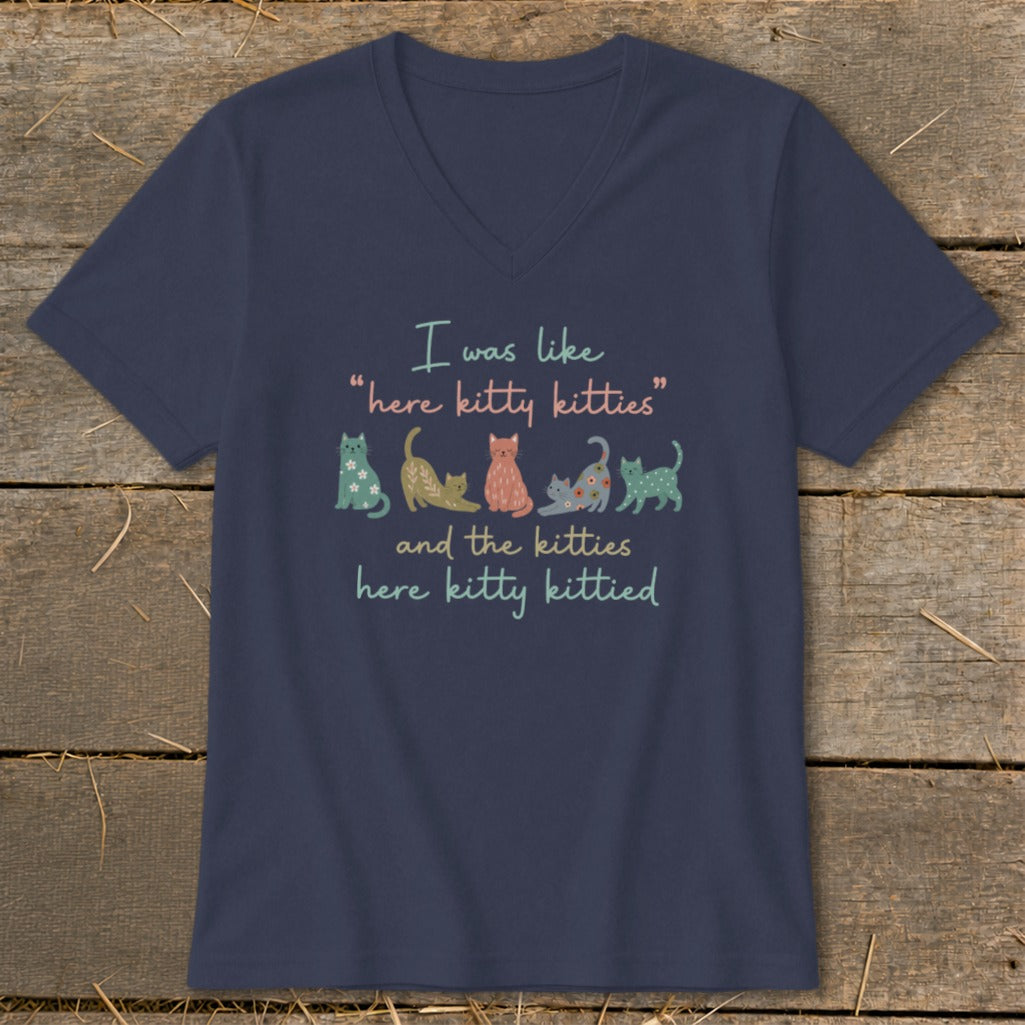 Navy t-shirt with "I was like "here kitty kitties" and the kitties here kitty kittied" and cats.