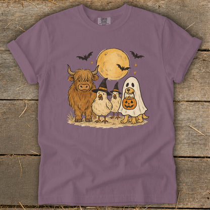 Halloween animals: highland cow, chickens, and dog in ghost costume, with moon and bats.