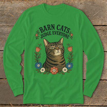 Green long sleeve shirt with a judgmental cat surrounded by flowers and text "Barn Cats Judge Everyone".