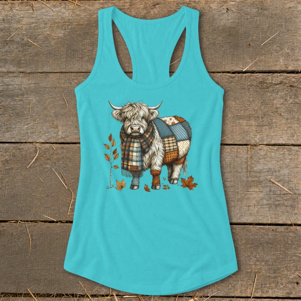 Highland cow graphic with patchwork body and plaid scarf on a teal tank top.