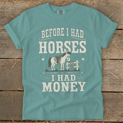 Teal t-shirt with "Before I Had Horses I Had Money" text and cartoon horse graphic.